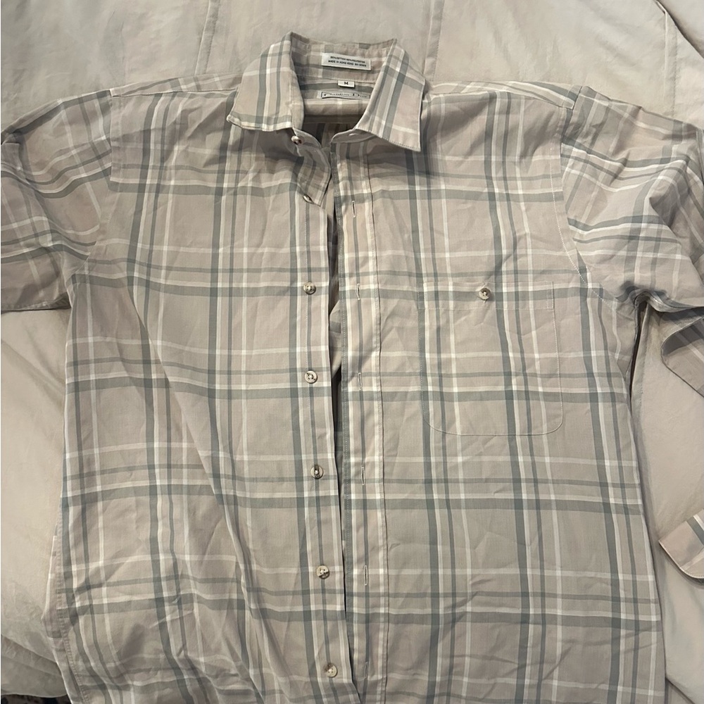 Christian Dior button up. Retails over $1,000. Size medium. Excellent condition.